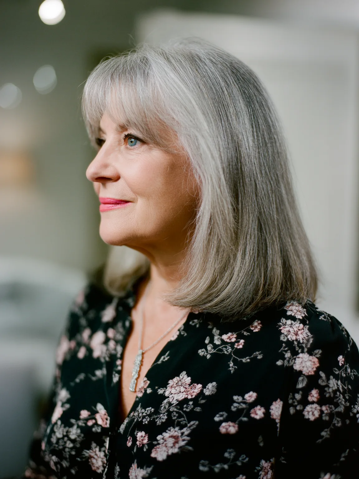 Blunt Shoulder-Length Silver Frost Bob with Curtain Bangs